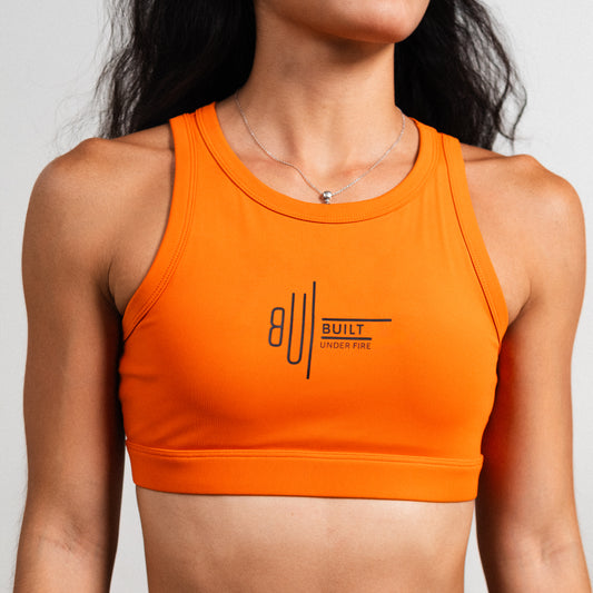 Orange Earth tank bra with supportive fit and smooth performance fabric.