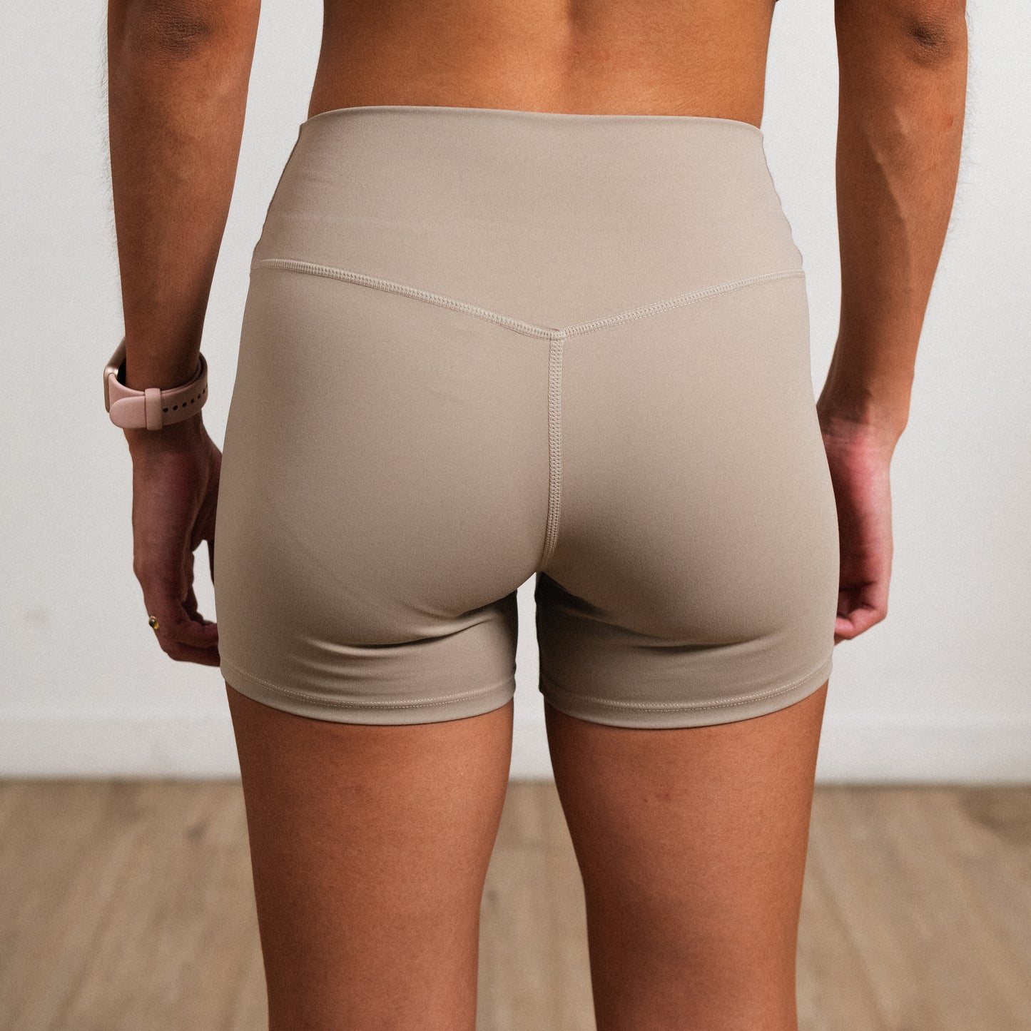 Khaki NOA shorts made with breathable stretch fabric for training and lifestyle wear.